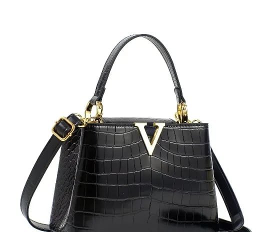 Black crocodile-embossed top-handle bag with gold V clasp